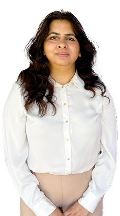 Woman with long dark hair wearing a white shirt and beige pants standing with arms by side on purple background