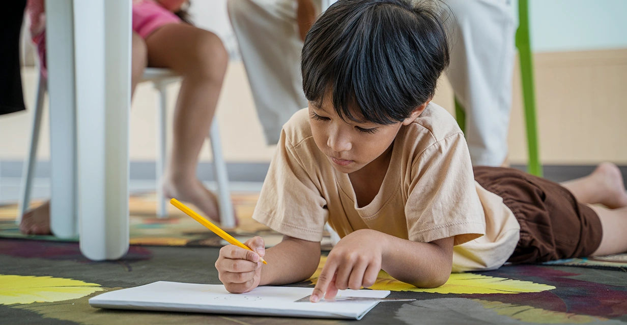 Year 3–9 student reading in library to build NAPLAN vocabulary