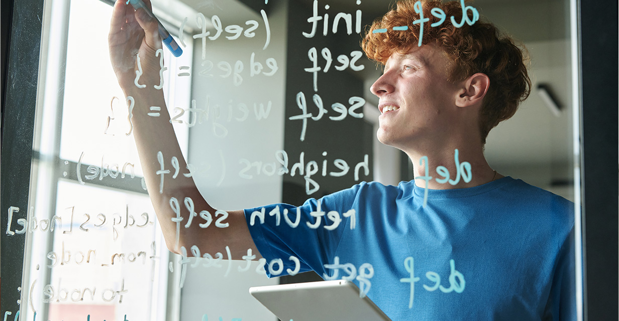 Year 3–9 student reading in library to build NAPLAN vocabulary