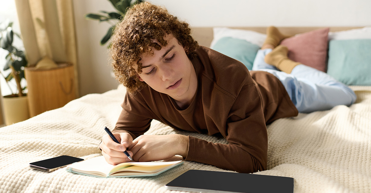 Year 3–9 student reading in library to build NAPLAN vocabulary