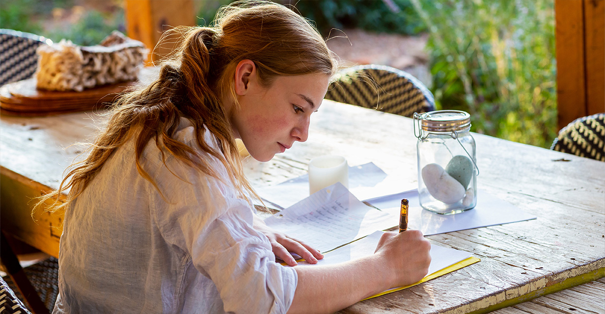 Year 3–9 student reading in library to build NAPLAN vocabulary